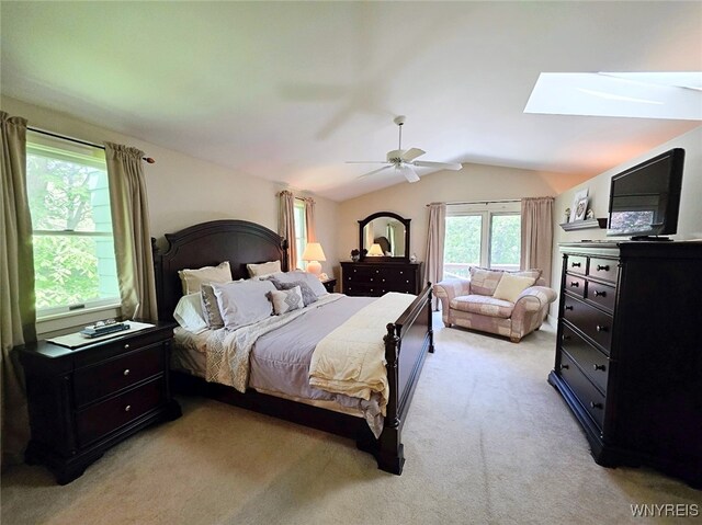 3666 S Hill Rd, Hamburg, NY 14075 - bedroom with a skylight, lofted ceiling, light colored carpet, and ceiling fan