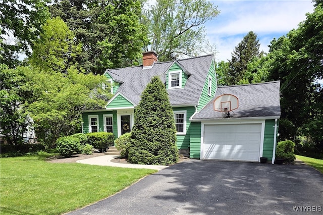 3666 S Hill Rd, Hamburg, NY 14075 - cape cod-style house featuring driveway, a chimney, a front yard, roof with shingles, and a garage