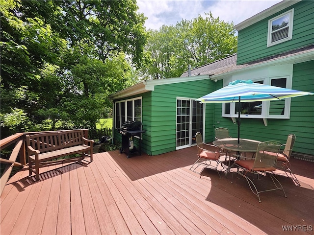 3666 S Hill Rd, Hamburg, NY 14075 - wooden terrace with area for grilling and outdoor dining area