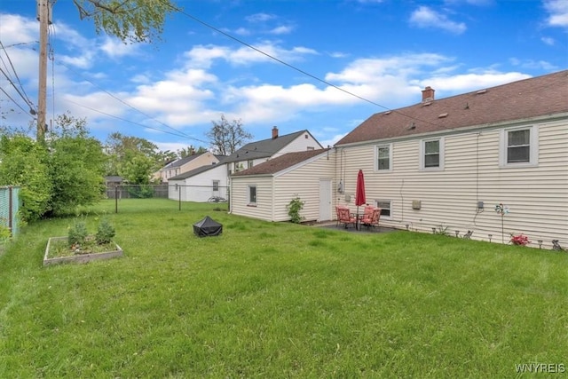 224 Dalton Dr, Tonawanda-Town, NY 14223 - back of house featuring a vegetable garden