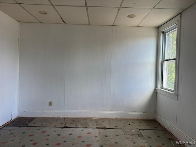 1306 E Lovejoy St, Buffalo, NY 14206 - unfurnished room with a paneled ceiling and baseboards