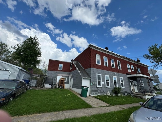 1306 E Lovejoy St, Buffalo, NY 14206 - multi unit property featuring a front yard