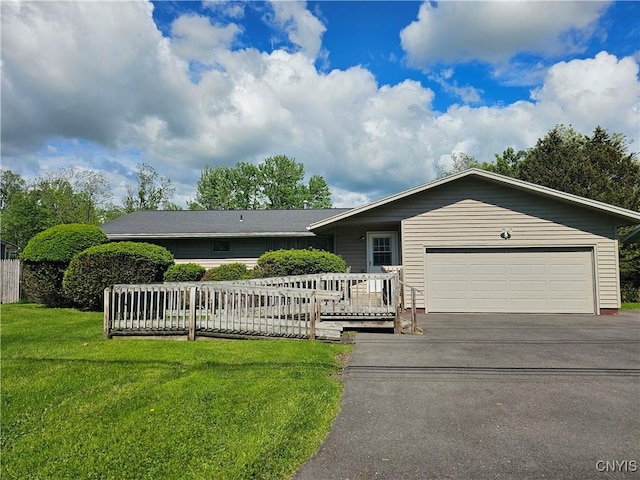 7742 Davis Rd S, Clay, NY 13212 - ranch-style house featuring a garage, driveway, and a front lawn