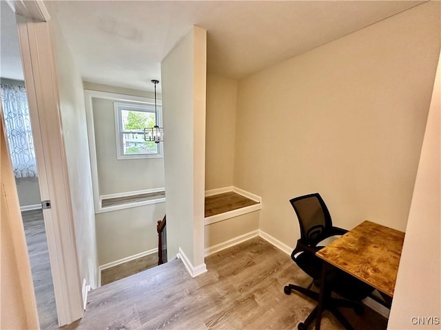 8408A Shallowcreek Rd, Clay, NY 13090 - office featuring wood finished floors, a chandelier, and baseboards