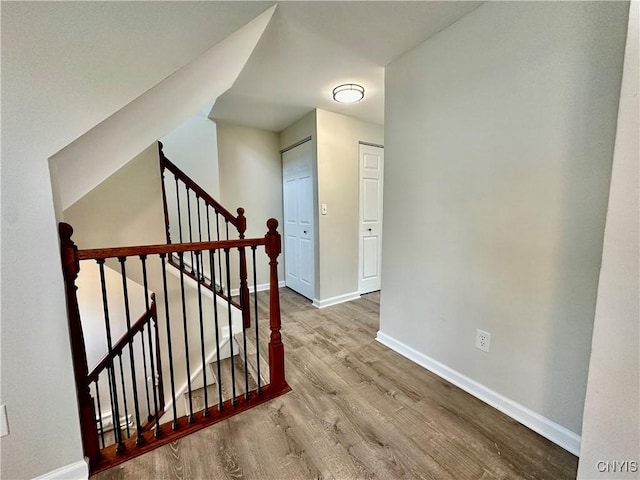8408A Shallowcreek Rd, Clay, NY 13090 - staircase with baseboards and wood finished floors