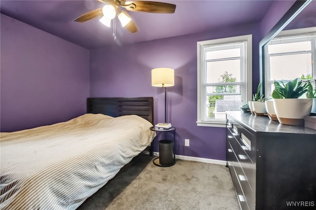 202 Tremaine Ave, Tonawanda-Town, NY 14217 - carpeted bedroom featuring multiple windows, baseboards, and a ceiling fan