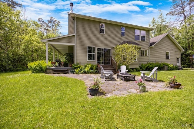 8105 Wilbarham Run, Pompey, NY 13104 - back of property with a patio, a lawn, and a fire pit