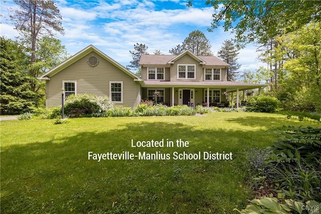 8105 Wilbarham Run, Pompey, NY 13104 - view of front of home featuring a front lawn and covered porch