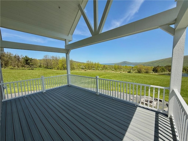 6731 County Road 12th Rd, South Bristol, NY 14512 - wooden deck with a lawn and a mountain view