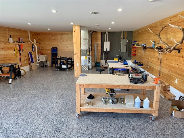 6731 County Road 12th Rd, South Bristol, NY 14512 - office featuring a workshop area, wood walls, tankless water heater, electric panel, and recessed lighting