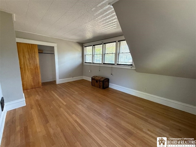 21 Juliet St, Jamestown, NY 14701 - unfurnished bedroom featuring light wood-style floors, a closet, and baseboards