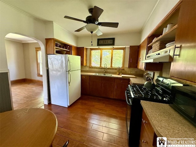 21 Juliet St, Jamestown, NY 14701 - kitchen featuring black appliances, open shelves, under cabinet range hood, dark wood finished floors, and crown molding