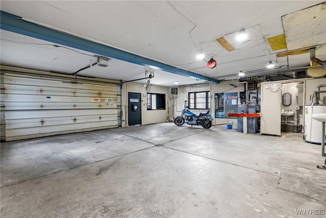 2365 Genesee St, Cheektowaga, NY 14225 - garage featuring water heater