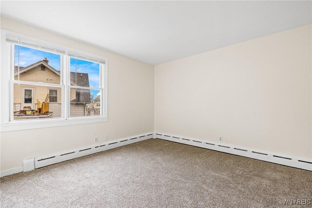 2365 Genesee St, Cheektowaga, NY 14225 - carpeted empty room with baseboards