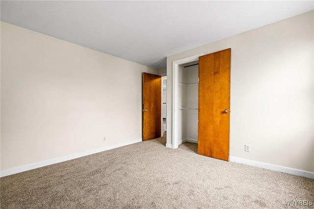2365 Genesee St, Cheektowaga, NY 14225 - unfurnished bedroom with carpet, baseboards, and a closet