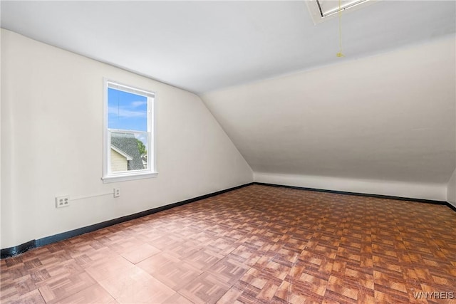2365 Genesee St, Cheektowaga, NY 14225 - bonus room with attic access, baseboards, and lofted ceiling