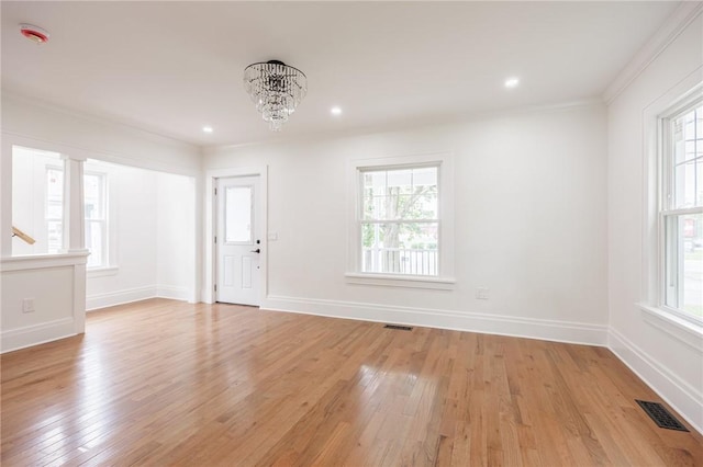 636 Ridge Rd, Webster, NY 14580 - foyer entrance with light wood-type flooring, a chandelier, ornamental molding, baseboards, and recessed lighting