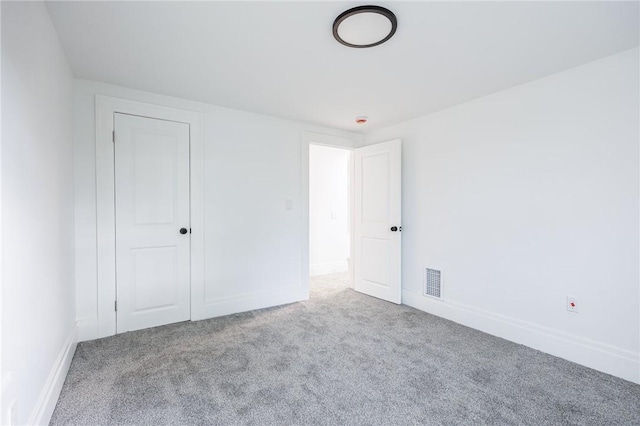 636 Ridge Rd, Webster, NY 14580 - unfurnished bedroom featuring carpet floors and baseboards