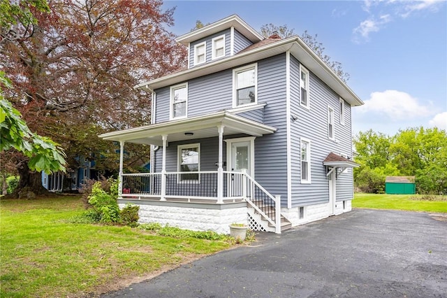 636 Ridge Rd, Webster, NY 14580 - traditional style home featuring a porch and a front yard