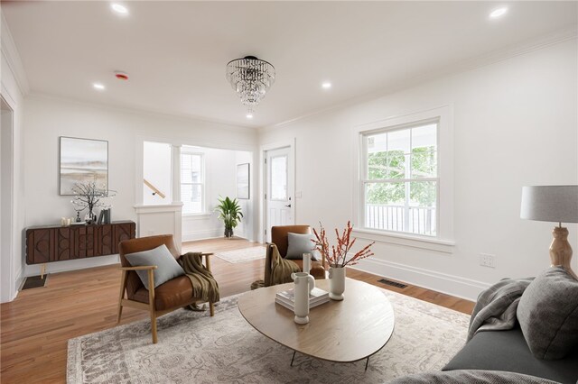 636 Ridge Rd, Webster, NY 14580 - living area featuring crown molding, plenty of natural light, recessed lighting, baseboards, and light wood finished floors