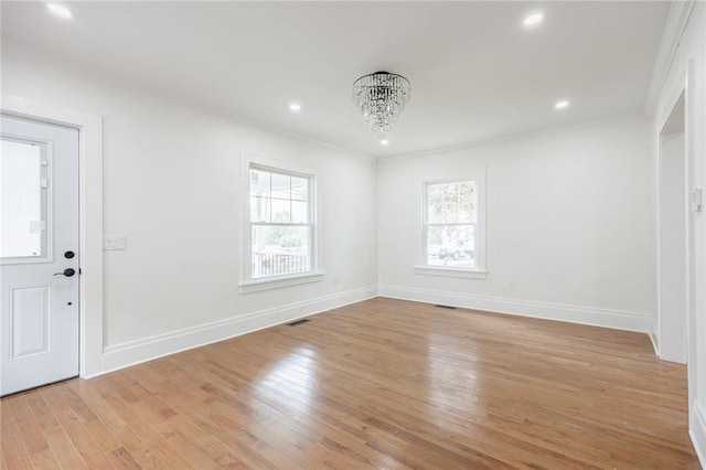 636 Ridge Rd, Webster, NY 14580 - entrance foyer featuring a chandelier, light wood-style flooring, baseboards, crown molding, and recessed lighting