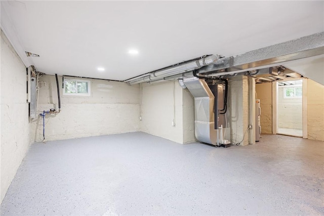 636 Ridge Rd, Webster, NY 14580 - below grade area featuring heating unit and water heater
