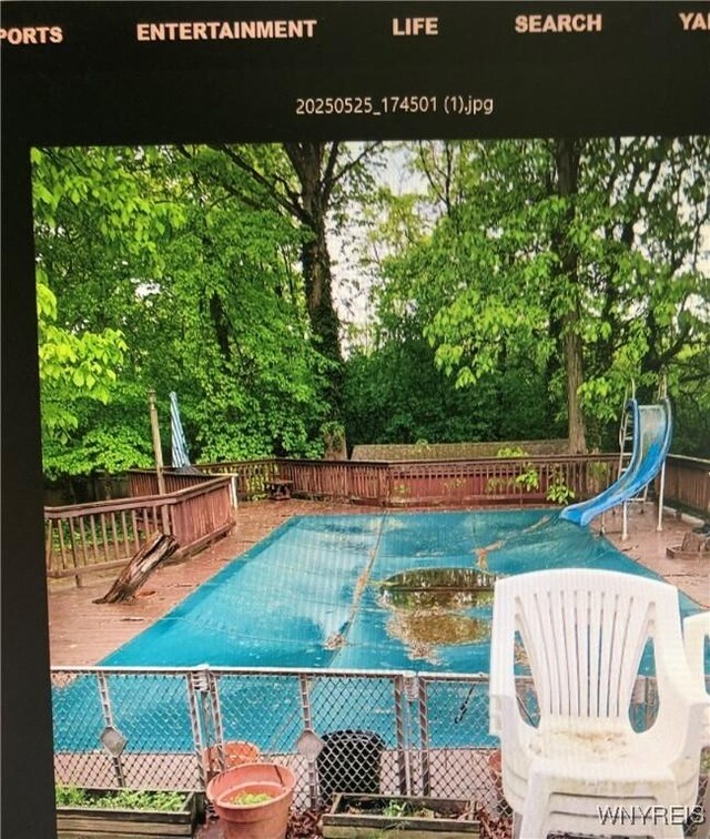 148 Marlin Rd, Grand Island, NY 14072 - view of swimming pool featuring a water slide and a wooden deck