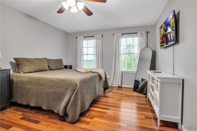 4343 Lockport Rd, Cambria, NY 14094 - bedroom with light wood-style floors and a ceiling fan