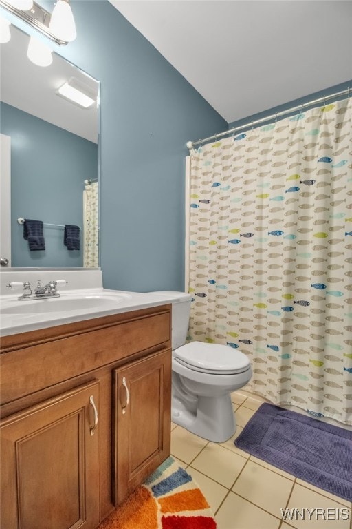 4343 Lockport Rd, Cambria, NY 14094 - bathroom featuring vanity, toilet, tile patterned floors, and curtained shower
