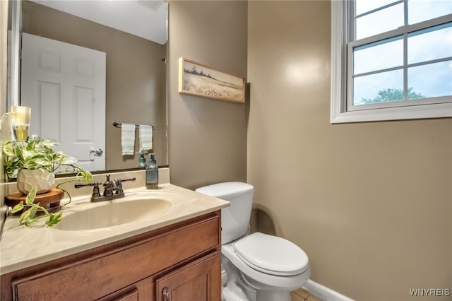 4343 Lockport Rd, Cambria, NY 14094 - half bathroom with toilet, vanity, and tile patterned floors