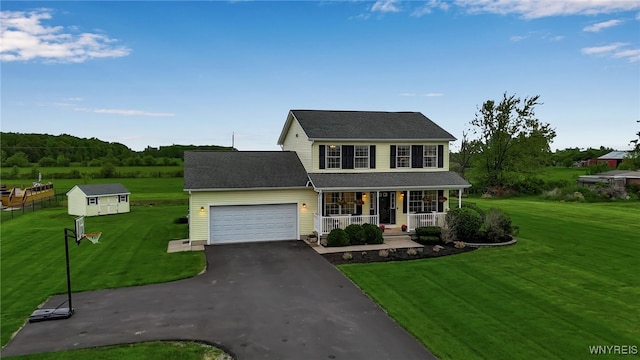 4343 Lockport Rd, Cambria, NY 14094 - view of front of home with covered porch, driveway, a front lawn, and a garage