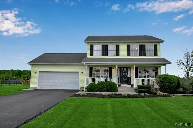 4343 Lockport Rd, Cambria, NY 14094 - colonial-style house featuring a porch, asphalt driveway, an attached garage, and a front yard