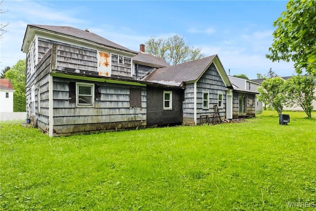 227 Mill St, Concord, NY 14141 - rear view of house featuring a lawn