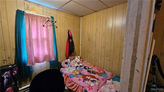 55 Lewis St, Buffalo, NY 14206 - bedroom with wooden walls and a drop ceiling