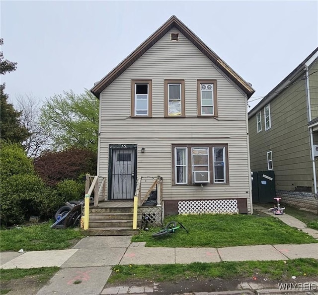 55 Lewis St, Buffalo, NY 14206 - traditional home featuring a front yard and cooling unit