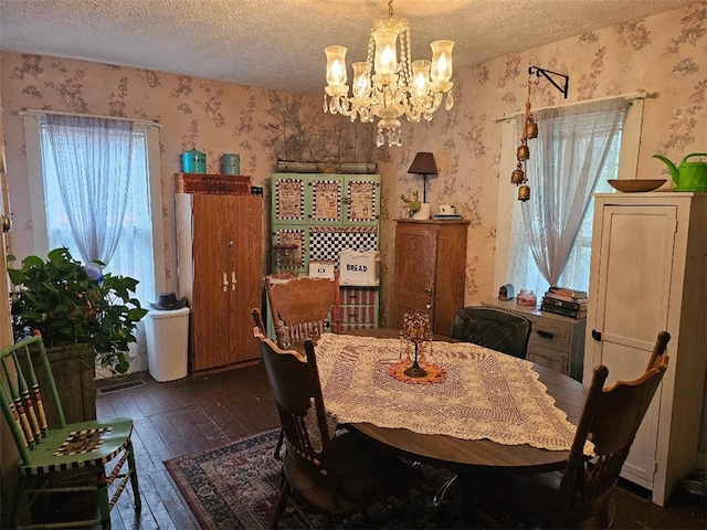 31 S Main St, Cohocton, NY 14826 - dining area featuring wallpapered walls, wood-type flooring, a chandelier, and a textured ceiling
