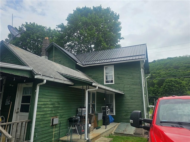 31 S Main St, Cohocton, NY 14826 - back of house with a chimney