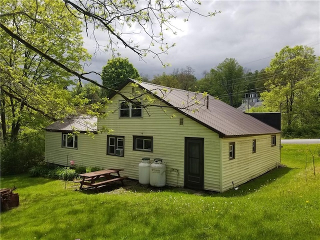 110 Furnace Hill Rd, Guilford, NY 13780 - back of house with a yard and metal roof
