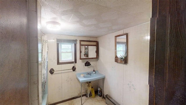 110 Furnace Hill Rd, Guilford, NY 13780 - full bath with a shower with curtain, a baseboard radiator, and a sink