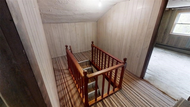 110 Furnace Hill Rd, Guilford, NY 13780 - staircase with wood walls and baseboard heating