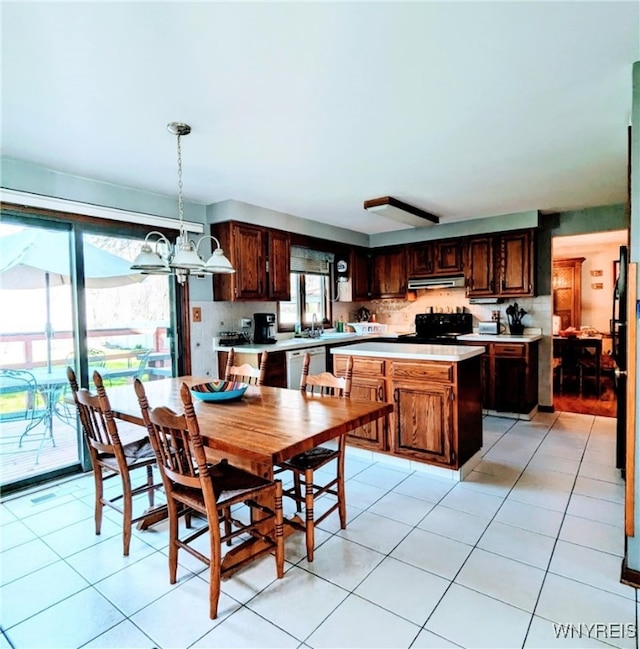 589 Briarwood Ln, Lewiston, NY 14092 - dining space with light tile patterned floors
