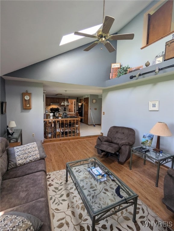 589 Briarwood Ln, Lewiston, NY 14092 - living room featuring high vaulted ceiling, a ceiling fan, and wood finished floors