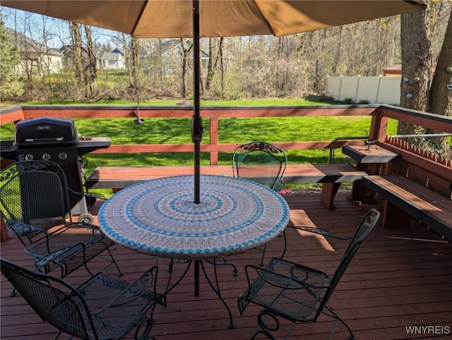 589 Briarwood Ln, Lewiston, NY 14092 - wooden terrace with area for grilling, a yard, and outdoor dining area