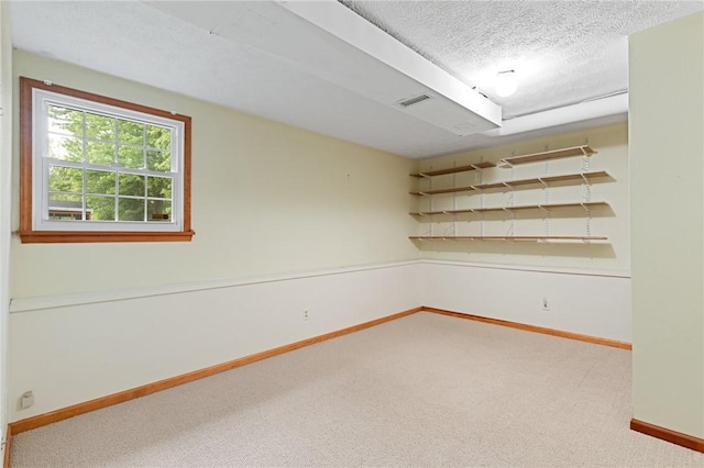 194 Citation Dr, Henrietta, NY 14467 - empty room with carpet flooring, baseboards, and a textured ceiling