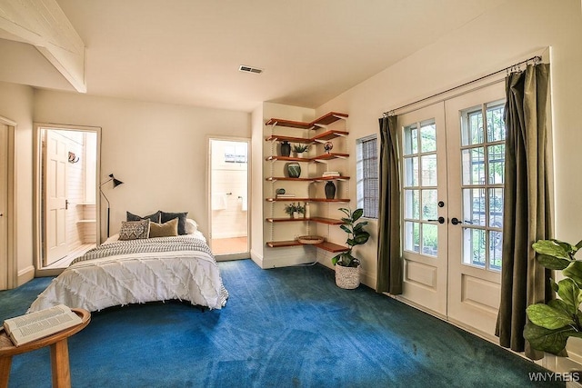 403 Elmwood Ave, Buffalo, NY 14222 - bedroom with french doors, dark carpet, baseboards, and connected bathroom