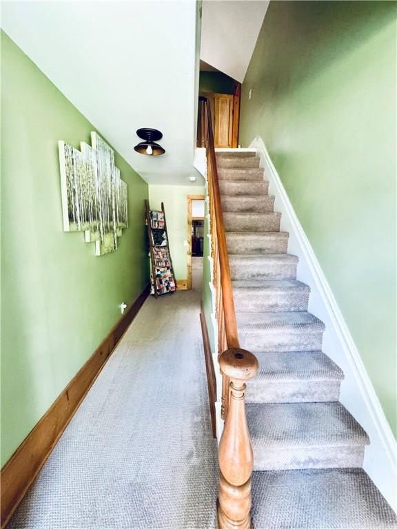 245 Owego St, Montour, NY 14865 - staircase featuring carpet floors and baseboards