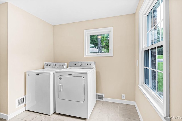 5 Glencrest Blvd, New Hartford, NY 13413 - laundry area with separate washer and dryer, healthy amount of natural light, and baseboards