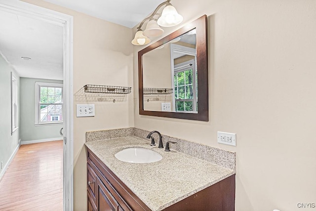 5 Glencrest Blvd, New Hartford, NY 13413 - bathroom featuring vanity, wood finished floors, and baseboards