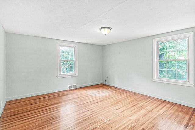 5 Glencrest Blvd, New Hartford, NY 13413 - spare room with wood finished floors and baseboards