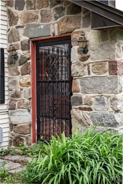 1466 Grant Rd, Russia, NY 13324 - doorway to property featuring stone siding